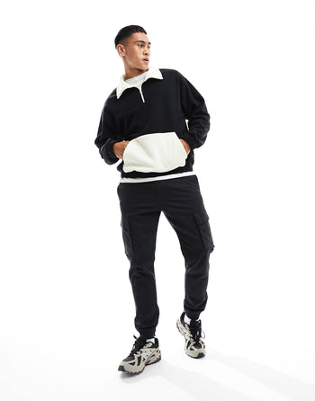 oversized funnel neck half zip polar fleece sweatshirt in black with contrast pocket