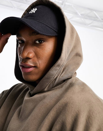 unisex oversized zip thru hoodie in brown with outdoors back & sleeve print